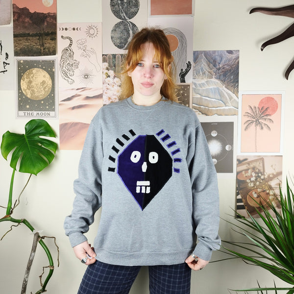 Tribal mask sweater in grey (L)