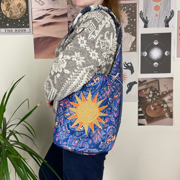 Sun and moon shoulder bag