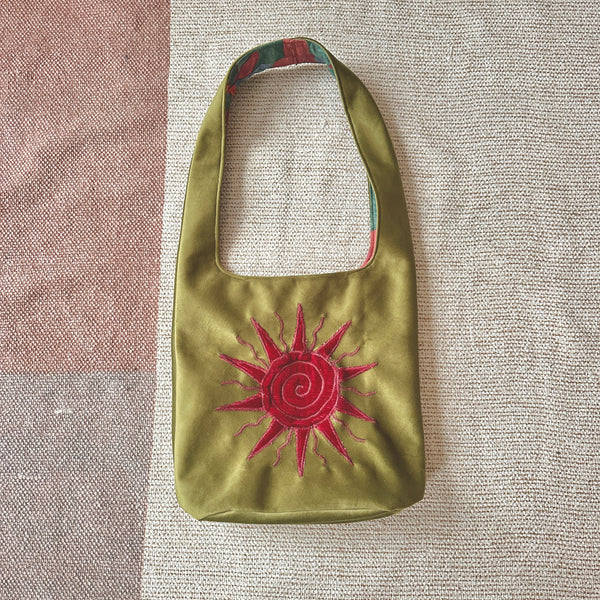 Sun and moon shoulder bag