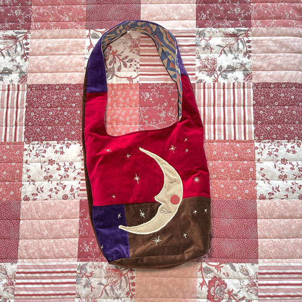 Sun and moon shoulder bag