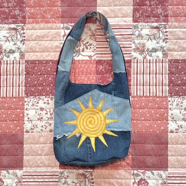 Sun and moon shoulder bag