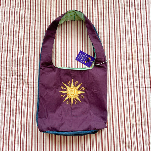 Sun and moon shoulder bag