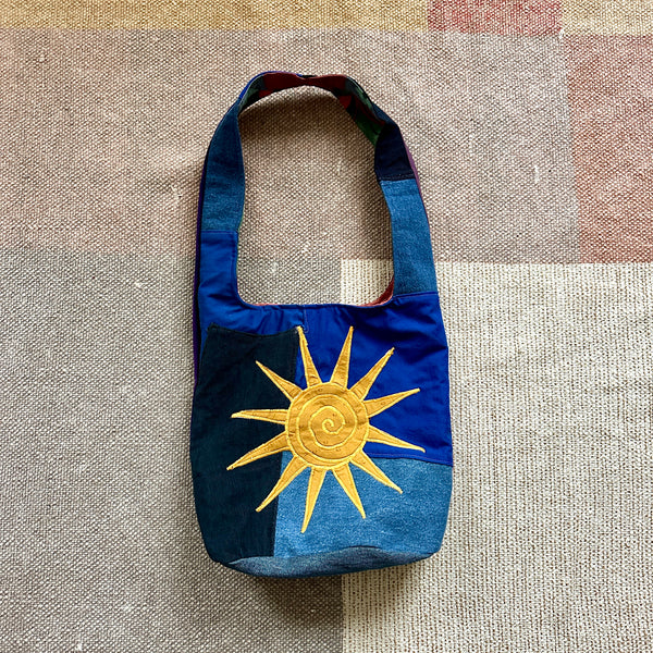 Sun and moon shoulder bag
