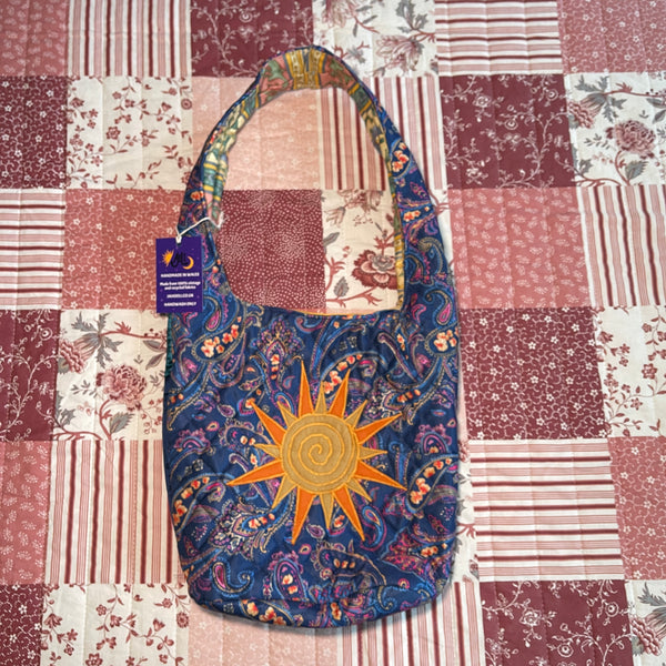 Sun and moon shoulder bag