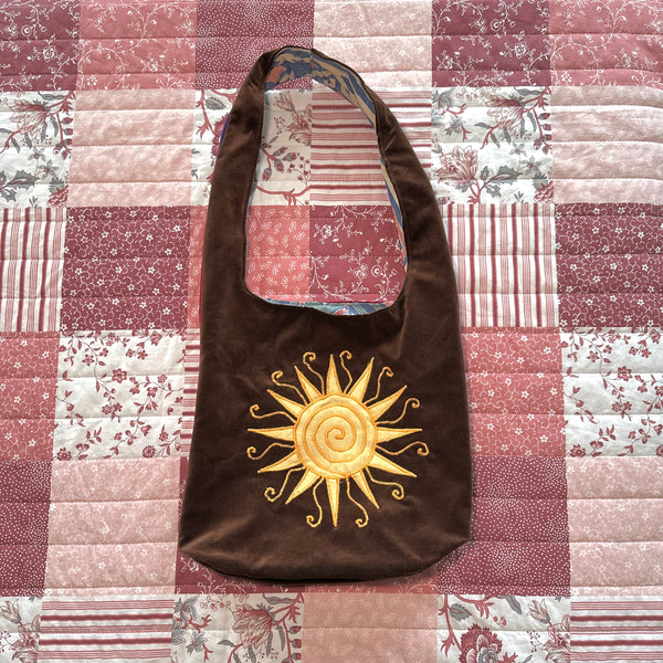 Sun and moon shoulder bag