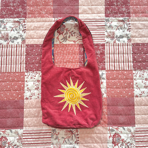 Sun and moon shoulder bag