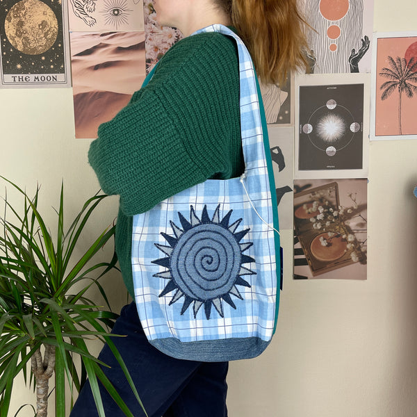 Sun and moon shoulder bag