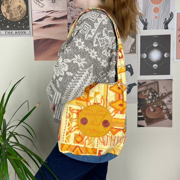 Sun and moon shoulder bag