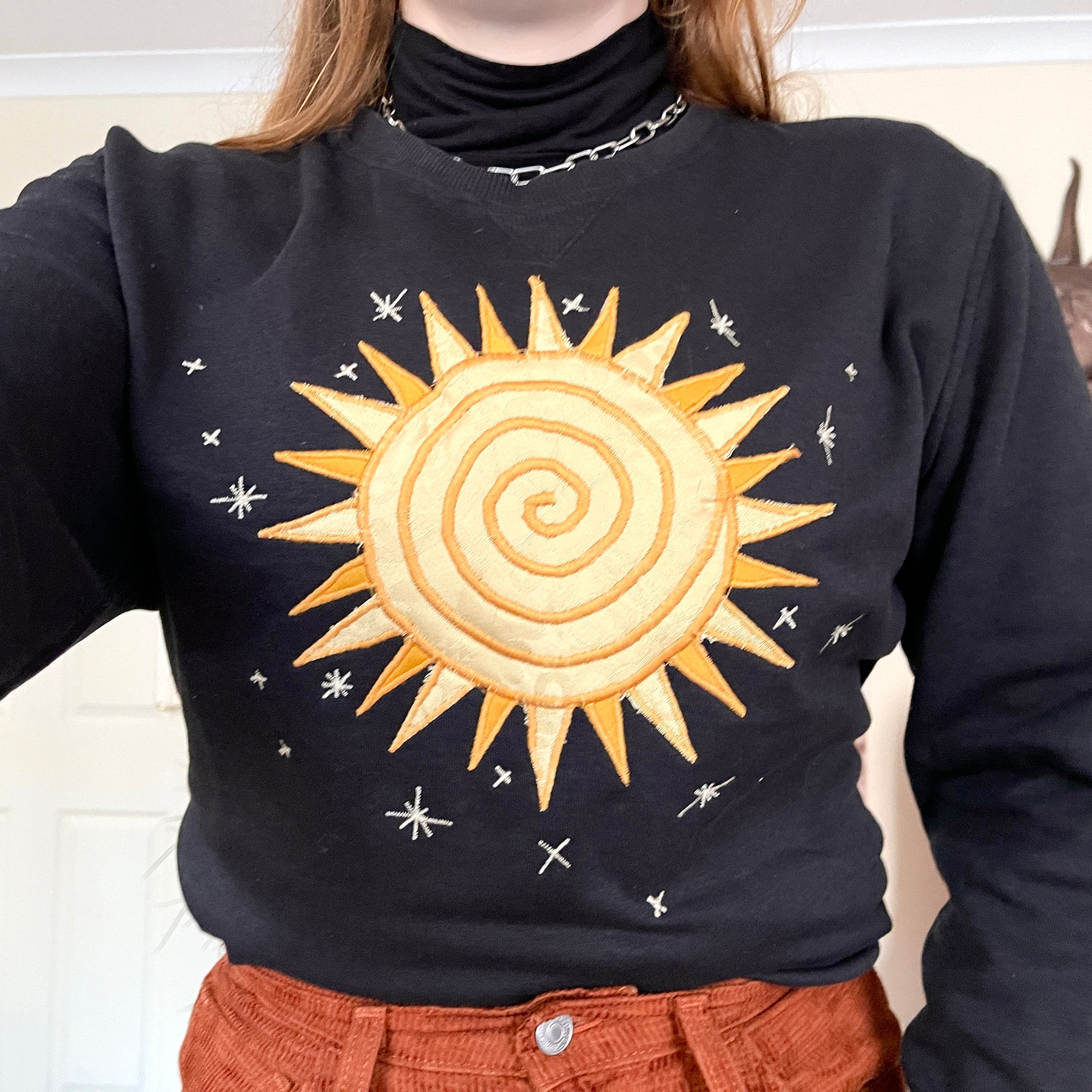 Sun sweater in black (S)