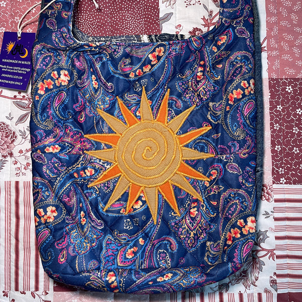 Sun and moon shoulder bag