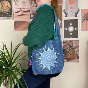 Sun and moon shoulder bag