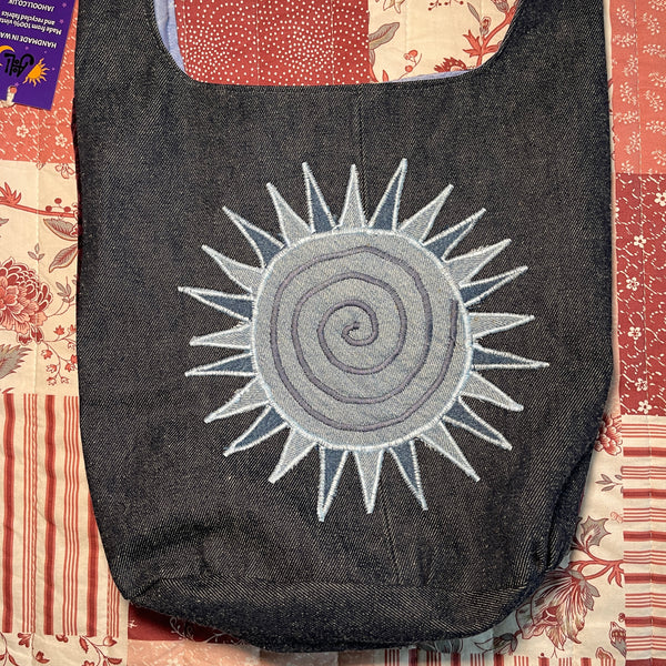 Sun and moon shoulder bag