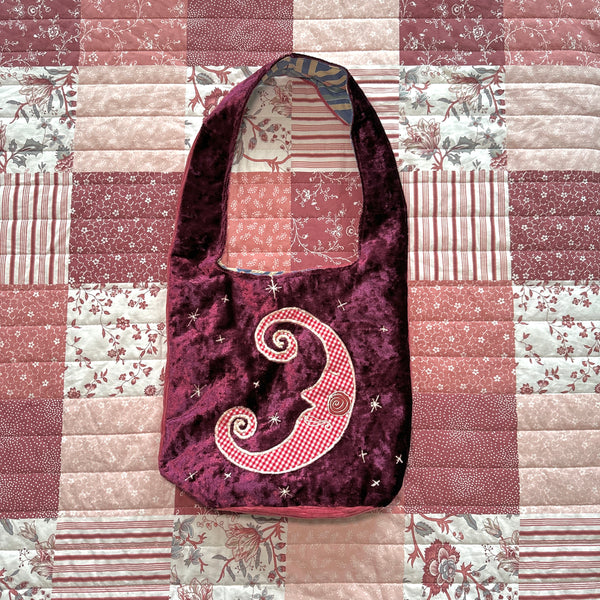 Sun and moon shoulder bag