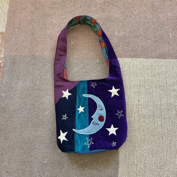Sun and moon shoulder bag