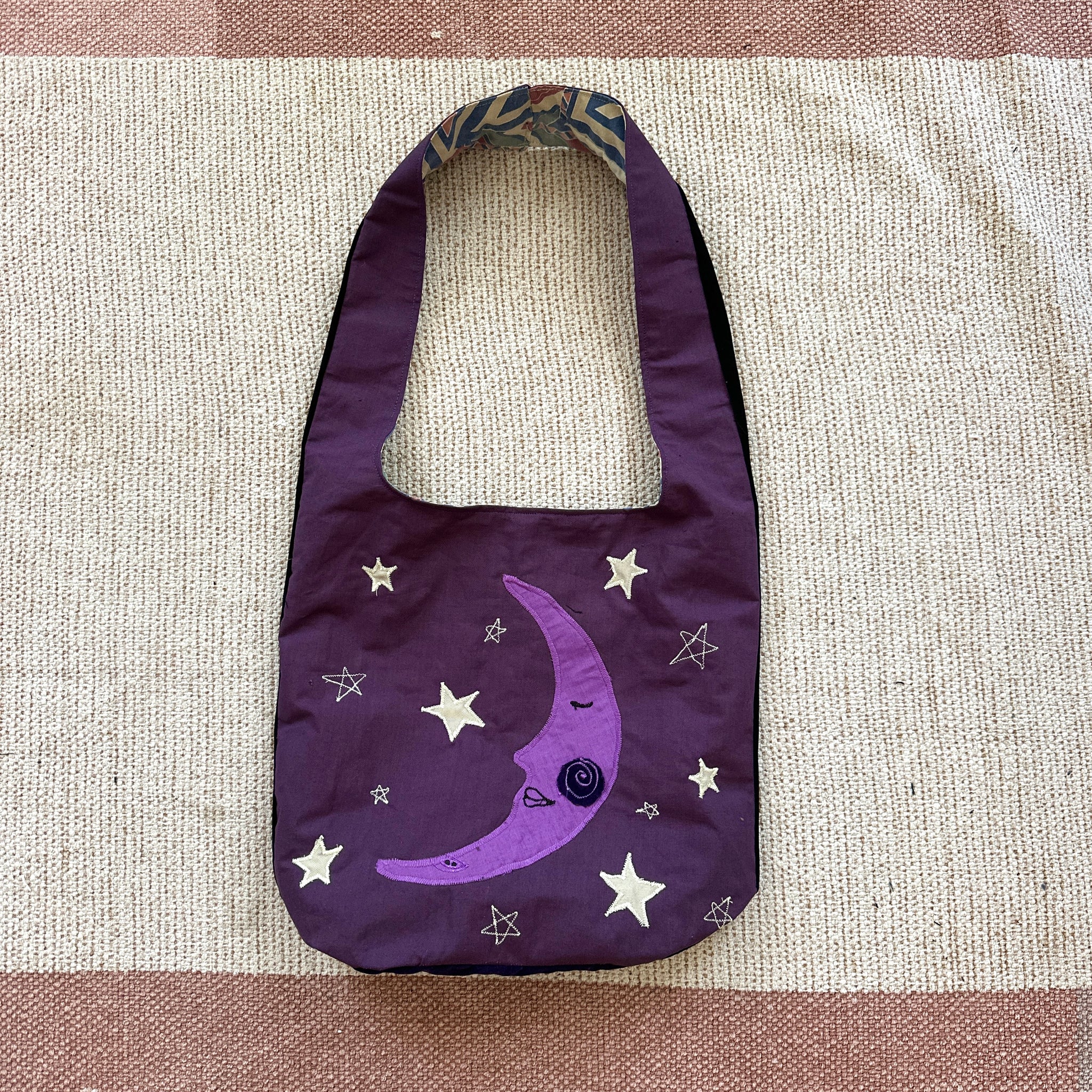 Sun and moon shoulder bag