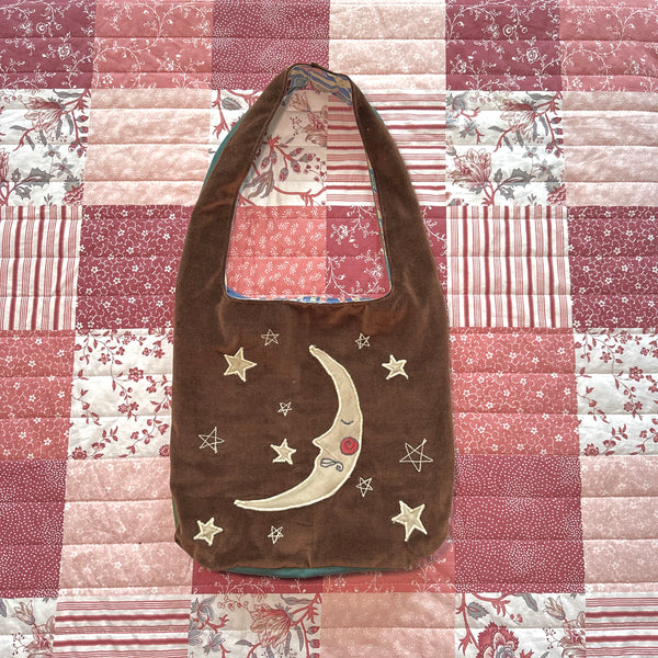 Sun and moon shoulder bag