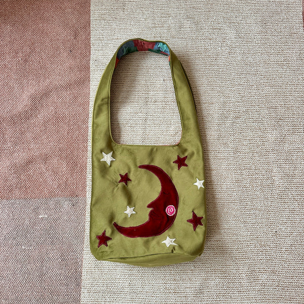 Sun and moon shoulder bag