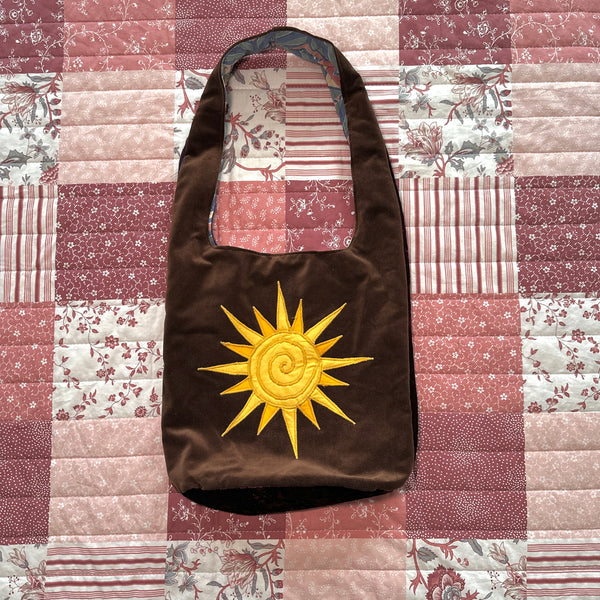 Sun and moon shoulder bag