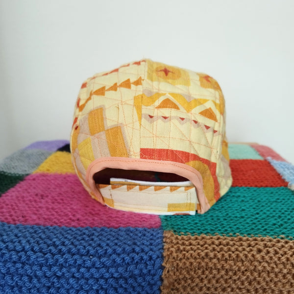 Ochre quilted cap