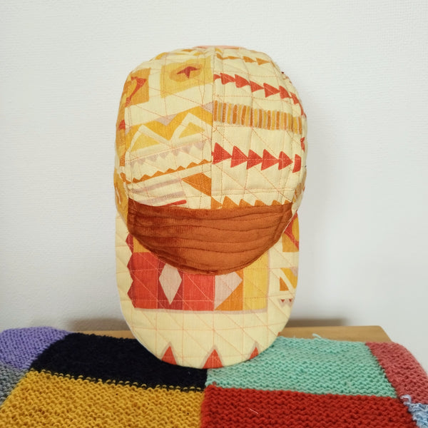 Ochre quilted cap