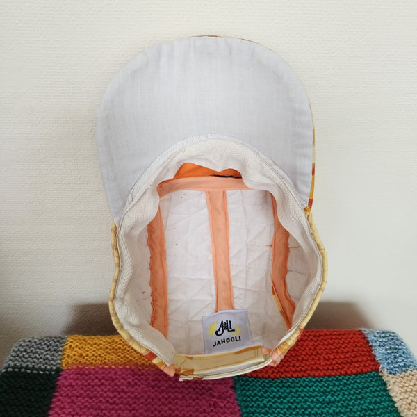 Ochre quilted cap